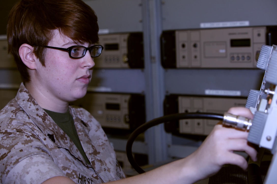 Cpl. Kristen Hirst runs a communication test on a communications service monitor at Marine Corps Air Station Cherry Point, N.C., June 16, 2015. Air traffic control Marines receive additional training once they arrive on the air station to familiarize themselves with equipment specific to the site. Hirst is an air traffic control communications technician trainee with Head quarters and Headquarters Squadron.