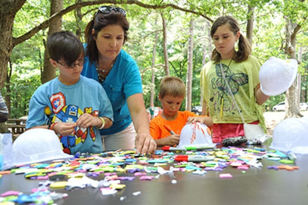 Children decorated their own "hard hats" during the U.S. Army Engineering and Support Center, Huntsville's Engineer Day awards ceremony and picnic June 5 at Monte Sano State Park in Huntsville, Alabama. 