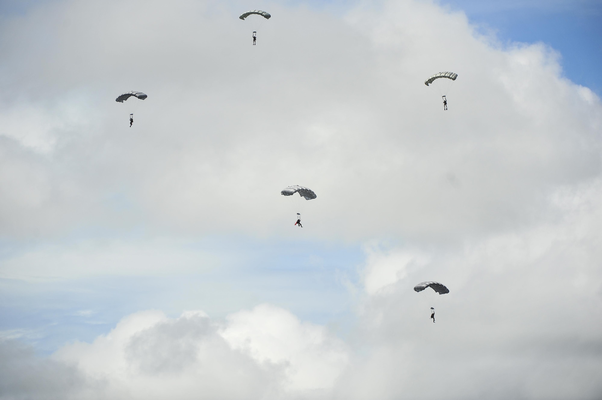 Special Tactics Airmen from the 24th Special Operations Wing perform high-altitude, low-opening jumps into the Santa Rosa Sound during a Monster Mash training event on Eglin Range, Fla., June 11, 2015. Monster Mash is a long-standing special tactics training tradition, consisting of an obstacle course where special operators complete timed scenarios at different stations of special tactics core mission training. (U.S. Air Force photo/Senior Airman Jeff Parkinson)
