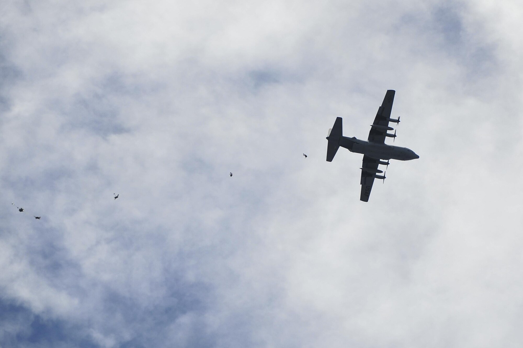 Special Tactics Airmen from the 24th Special Operations Wing perform high-altitude, low-opening jumps into the Santa Rosa Sound during a Monster Mash training event on Eglin Range, Fla., June 11, 2015. Monster Mash is a long-standing special tactics training tradition, consisting of an obstacle course where special operators complete timed scenarios at different stations of core mission training. (U.S. Air Force photo/Senior Airman Jeff Parkinson)
