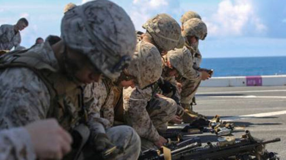 Marines with 2nd Platoon, Charlie Company, 1st Battalion, 6th Marine Regiment load their ammunition before conducting close-quarters training aboard the USS San Antonio en route from New York City to Europe for BALTOPS May 26-June 6, 2015. BALTOPS is an annual exercise that provides the opportunity for NATO and regional partners to strengthen inoperability through a series of tactical maneuvers and scenarios. The exercise involves Marines, sailors, airmen and soldiers of participating nations working side-by-side to enhance each other’s tactics and expertise, both on land and sea.