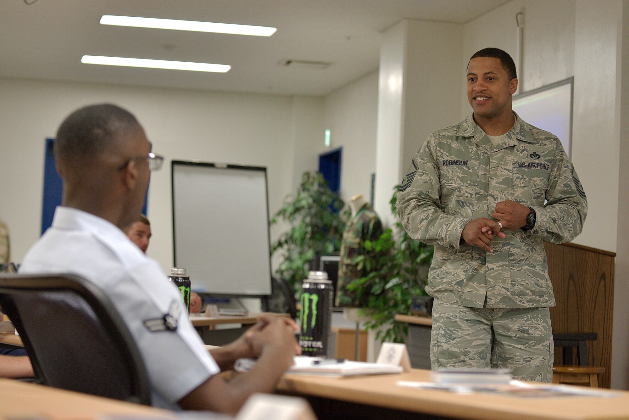 U.S. Air Force Master Sgt. Daniel Robinson, 35th Fighter Wing career assistance advisor, speaks to First Term Airman Center class members at Misawa Air Base, Japan, June 1, 2015. Robinson explained to the Airmen the value of taking charge of their careers and how they can accomplish anything with the right mindset and goals. (U.S. Air Force photo by Senior Airman Jose L. Hernandez-Domitilo/Released)