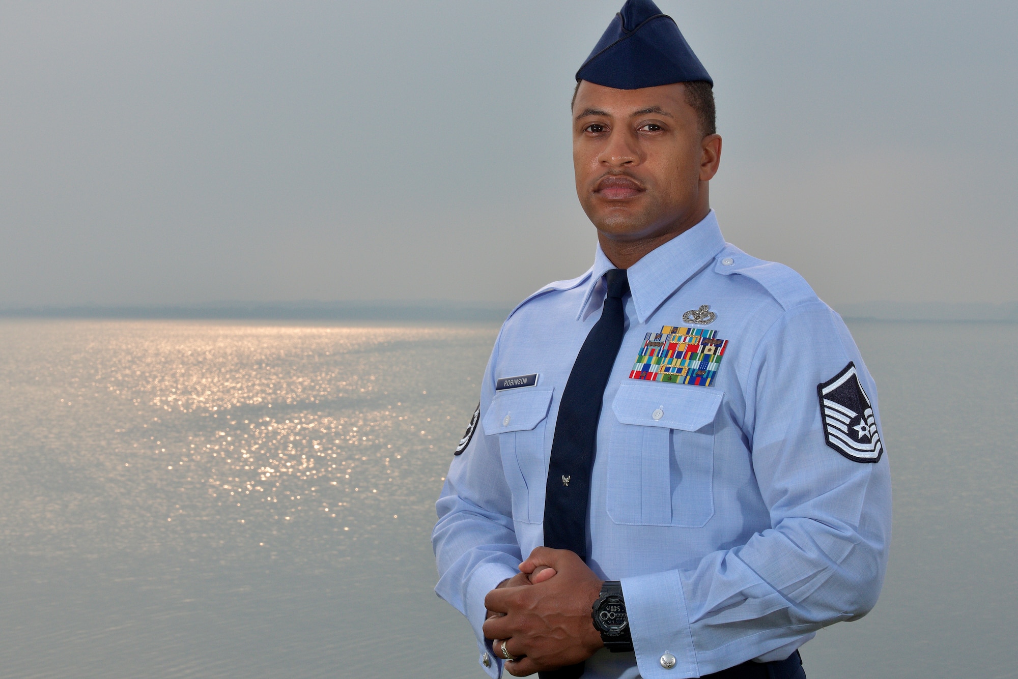 U.S. Air Force Master Sgt. Daniel Robinson, 35th Fighter Wing career assistance advisor, shares the experiences that led to his dedication to serving as guide and mentor for many Airmen at Misawa Air Base, Japan, June 16, 2015. With career advancement opportunities missed throughout his early years from having no support or a mentor, he now strives to be the guide he wished he had as a younger Airman. (U.S. Air Force photo by Senior Airman Jose L. Hernandez-Domitilo)