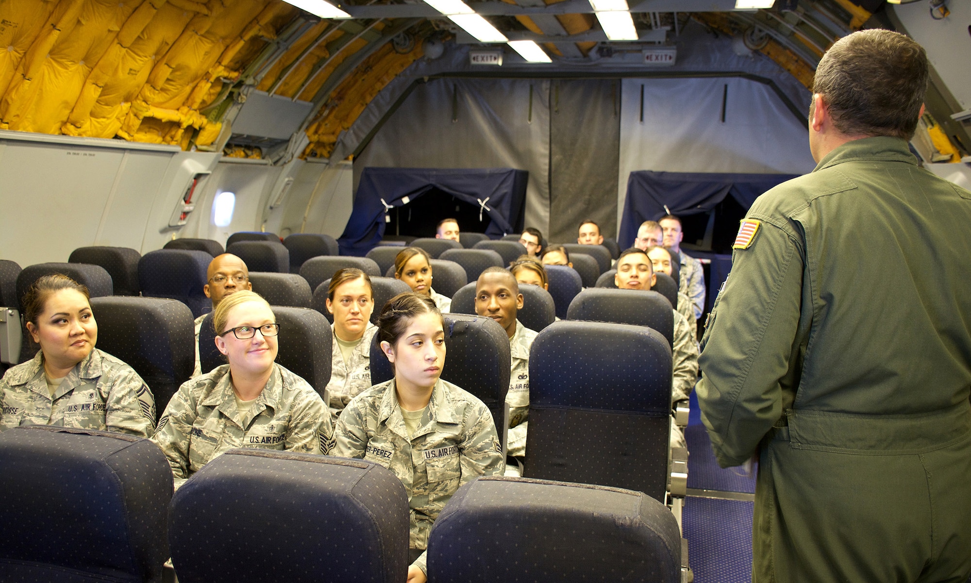 TRAVIS AIR FORCE BASE, Calif. --Tech. Sgt. Brandon Heyman briefs aircraft safety procedures before the takeoff of a KC-10 Extender June 6, 2015 at Travis Air Force Base, California. The crew members supported flying more than 15 Air Force Reservists assigned to the 349th Air Mobility Wing. Each individual took part in an orientation flight that allowed the wing top performers to experience the wing's aerial refueling mission. During the weekend, the 349th AMW hosted an Air Force Speciality Code Training Weekend, providing reservists with hands-on, realistic training that helps members hone their skills. The AFSC Training Weekend centered around the wing's ability to respond to a major earthquake in northern California, while working in concert with other military, federal and state agencies to provide relief and support where needed. (U.S. Air Force photo by 2nd Lt. Stephen J. Collier/Released)