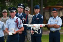 Cadet Senior Airman Cody Powell, Niceville High School Junior Reserve Officer Training Corps, maneuvers a multicopter during a demonstration held at Maxwell Air Force Base, Alabama, June 10, 2015.  About 17 cadets from the Florida high school were at Maxwell to demonstrate the capabilities of their newest science, technology, engineering and mathematics, or STEM, teaching and learning tool they call the multicopter, or quadcopter, a remote-controlled aircraft propelled by four rotors. Cadets learn how to fly the multicopter and maneuver its camera while also learning how to work in a team environment.  (Air Force Photo by Melanie Rodgers Cox/Cleared)