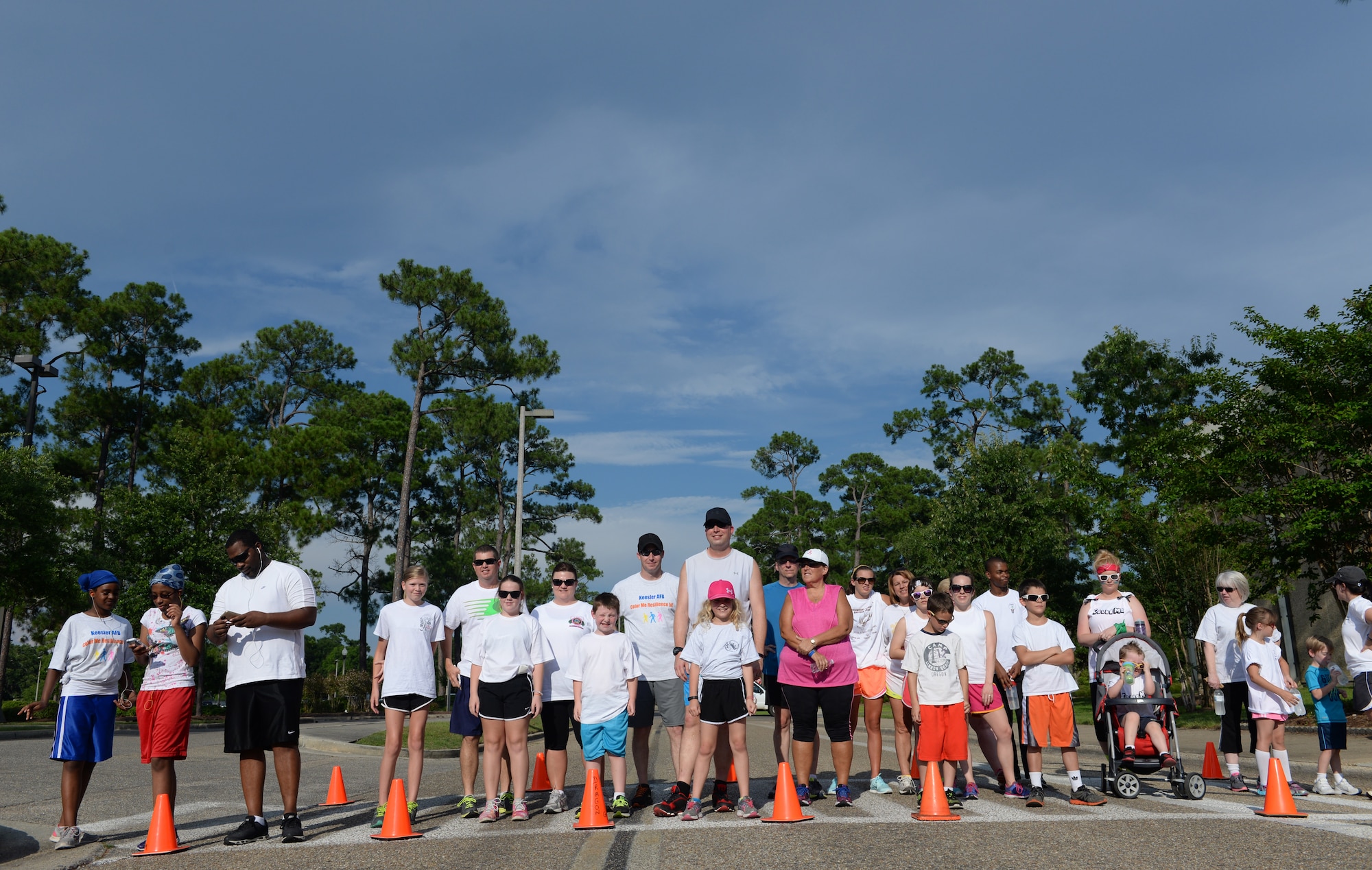 Participants of Wingman Week’s “Resilient Color Me 5K” line up at the starting line June 8, 2015, Keesler Air Force Base, Miss. More than 170 Keesler personnel and family members participated in the run/walk, which featured a color station for each domain of Comprehensive Airman Fitness – social, spiritual, mental and physical. (U.S. Air Force photo by Airman 1st Class Duncan McElroy)