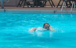 Baylie Kraft, 502nd Force Support Squadron lifeguard, warms up before her shift June 12 at the JBSA-Randolph Parr Club Pool. (U.S Air Force photo by Airman 1st Class Stormy Archer)
