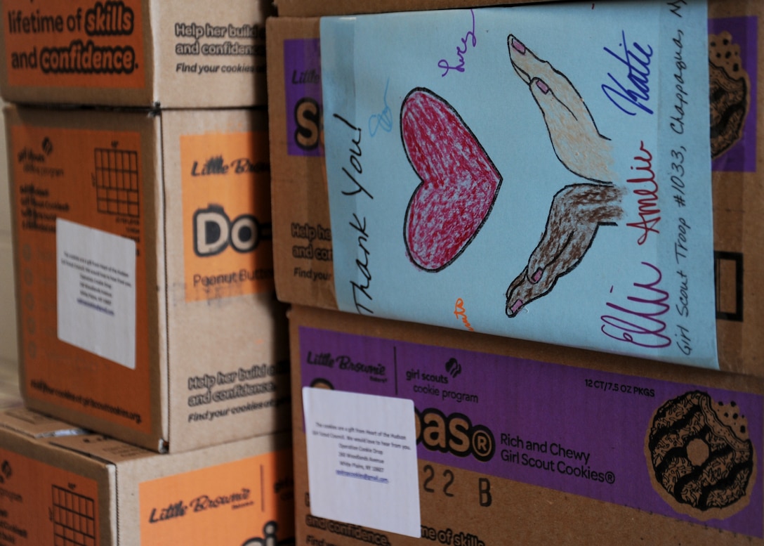 In a loading dock at Joint Base Andrews, Md., a sign on a case of Girl Scout Cookies reads, “Thank You!” June 16, 2015. This case and hundreds of others were donated to service members and their families by Girl Scouts Troops for Operation Cookie Drop/Girl Scouts Heart of the Hudson Council. (U.S. Air Force photo/ Staff Sgt. Nichelle Anderson) 