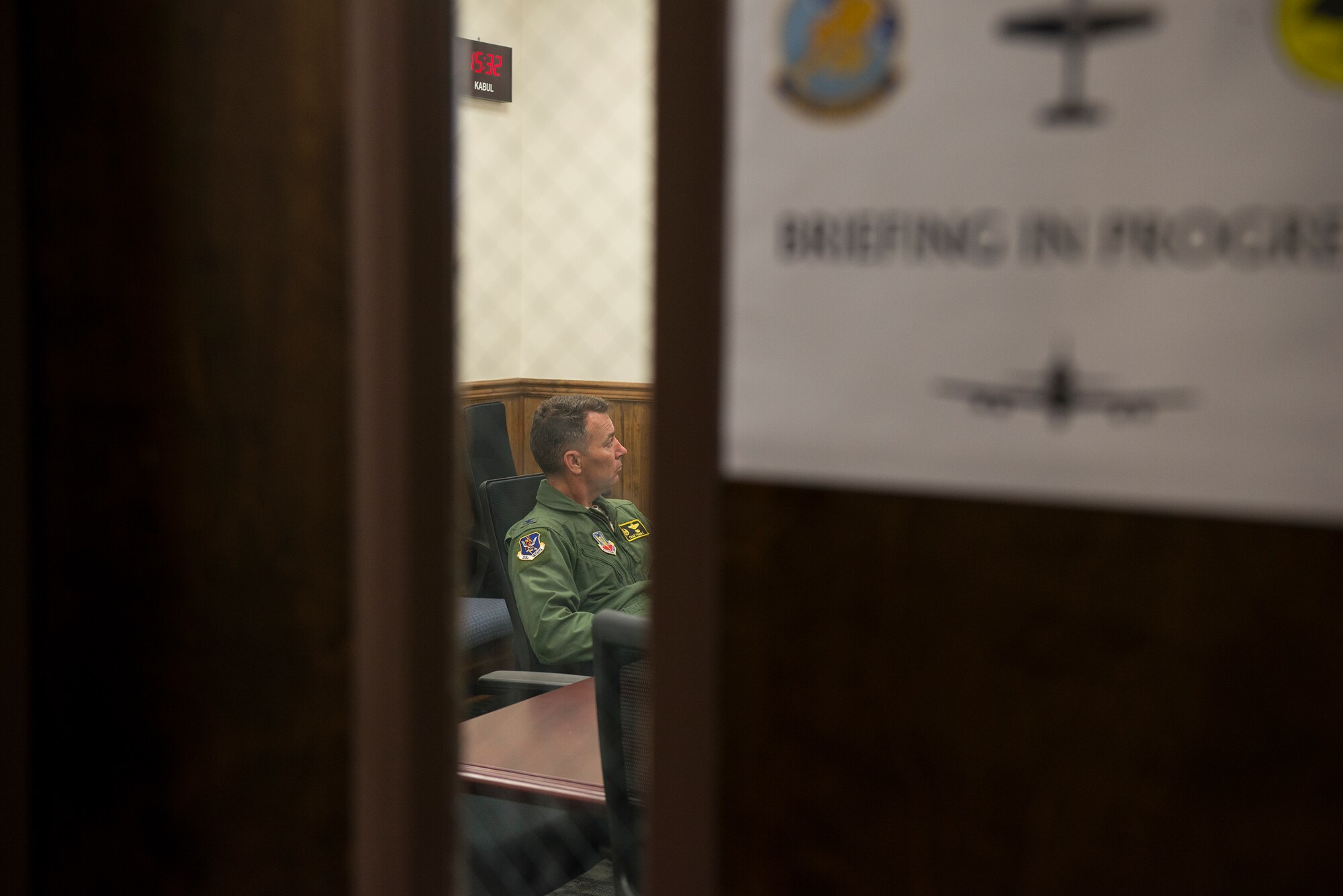 U.S. Air Force Col. Chad Franks, 23d Wing commander, listens during an egress briefing June 16, 2015, at Moody Air Force Base, Ga. Franks toured the 81st Fighter Squadron and flew on the A-29 Super Tucano to experience its Afghan training mission. (U.S. Air Force Airman 1st Class Ceaira Tinsley/Released)