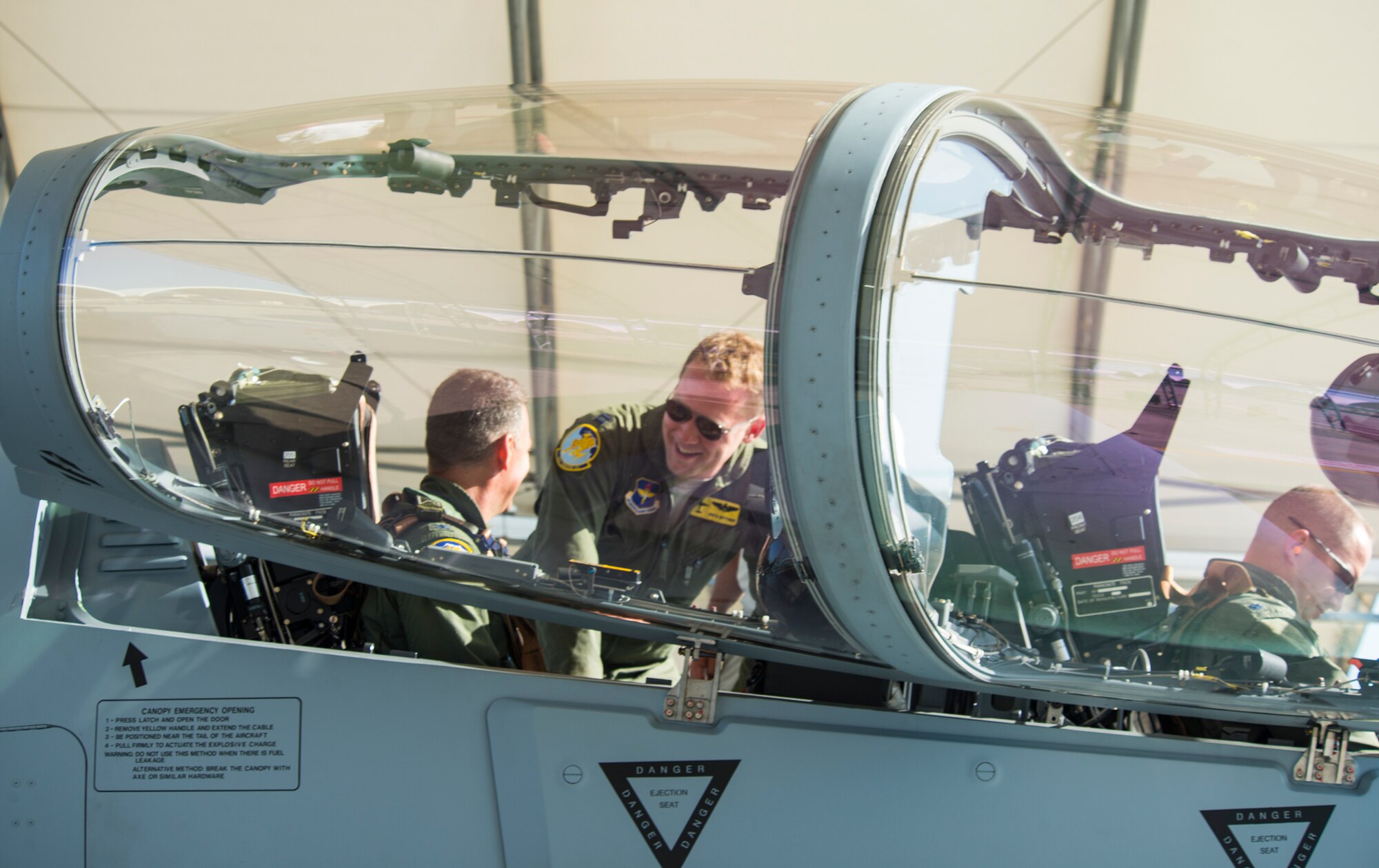 An 81st Fighter Squadron pilot identifies the different parts of the A-29 Super Tucano to U.S. Air Force Col. Chad Franks, 23d Wing commander, before takeoff June 16, 2015, at Moody Air Force Base, Ga. The 81st FS reactivated in January 2015 to train approximately 30 Afghan pilots and 90 maintainers at Moody. (U.S. Air Force Airman 1st Class Ceaira Tinsley/Released)