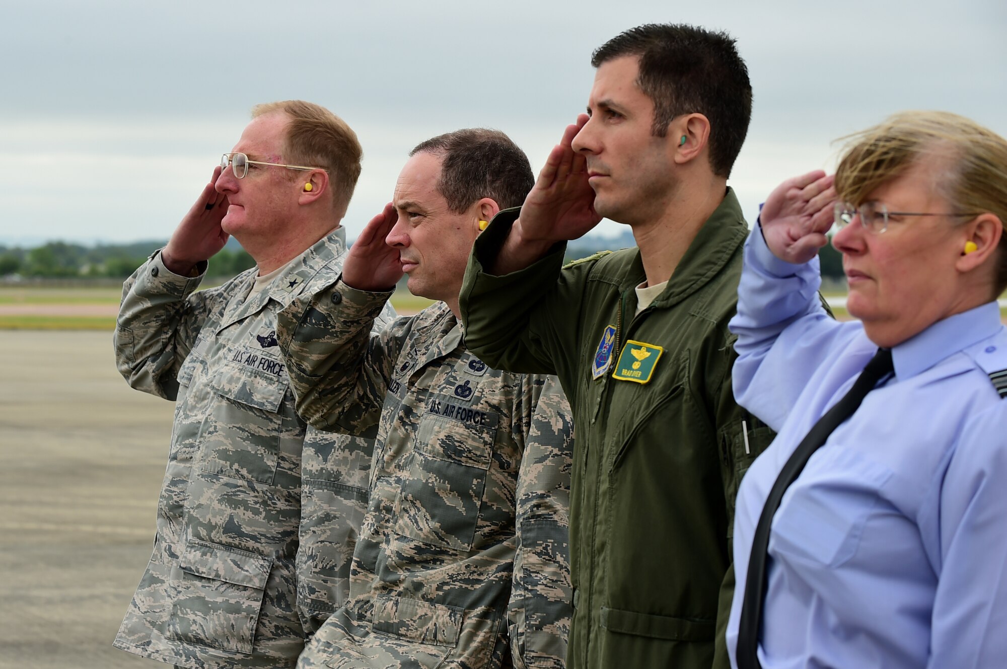 U.S. and U.K. leadership salute Secretary of the Air Force Deborah Lee James’s aircraft as she departs from RAF Fairford, United Kingdom, June 17, 2015. During James visit she was able to see and hear how  Air Force Global Strike Command are participating in the multi-national BALTOPS 2015 and Saber Strike exercises and see the facilities that RAF Fairford has to offer along with meeting airman participating in the exercises. (U.S. Air Force photo by Tech. Sgt. Chrissy Best)