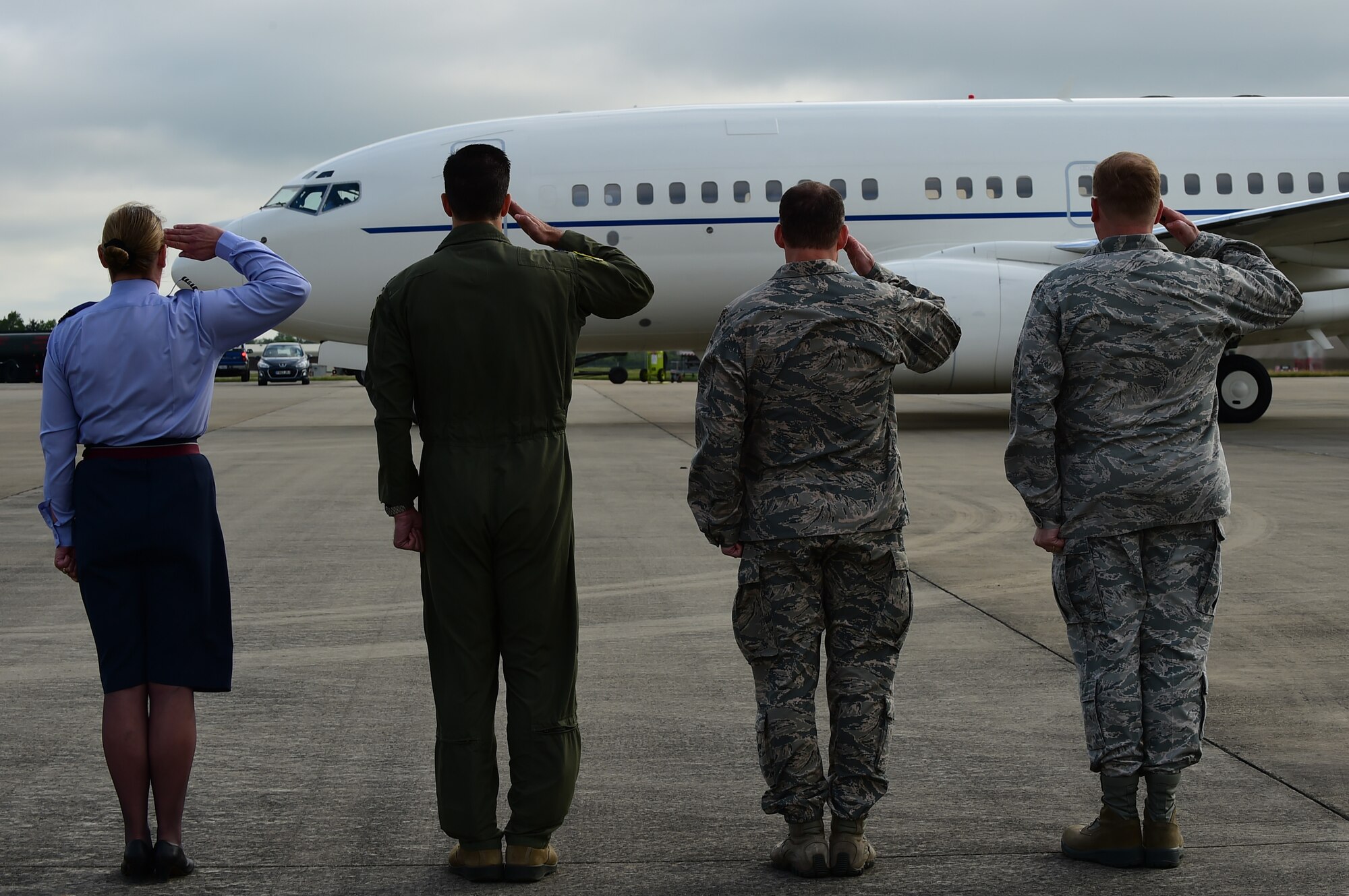 U.S. and U.K. leadership salute Secretary of the Air Force Deborah Lee James’s aircraft after landing at RAF Fairford, United Kingdom, June 17, 2015. During James visit she was able to see and hear how Air Force Global Strike Command are participating in the multi-national BALTOPS 2015 and Saber Strike exercises and see the facilities that RAF Fairford has to offer and meet Airmen participating in the exercises. (U.S. Air Force photo by Tech. Sgt. Chrissy Best)