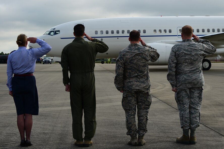 U.S. and U.K. leadership salute Secretary of the Air Force Deborah Lee James’s aircraft after landing at RAF Fairford, United Kingdom, June 17, 2015. During James visit she was able to see and hear how Air Force Global Strike Command are participating in the multi-national BALTOPS 2015 and Saber Strike exercises and see the facilities that RAF Fairford has to offer and meet Airmen participating in the exercises. (U.S. Air Force photo by Tech. Sgt. Chrissy Best)