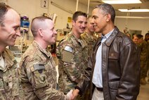 Chaplain (Capt.) Keith Manry shakes hands with President Barack Obama at the Craig Joint Theater Hospital, Bagram Airfield, Afghanistan. Manry along with a group of 25 other service members were selected to meet the president during a Memorial Day weekend visit in 2014. Manry is assigned to the 341st Missile Wing at Malmstrom Air Force Base, Mont., and was recently awarded the Air Force Chaplain Corps Company Grade Officer Chaplain of the Year for 2014. (Courtesy photo)
