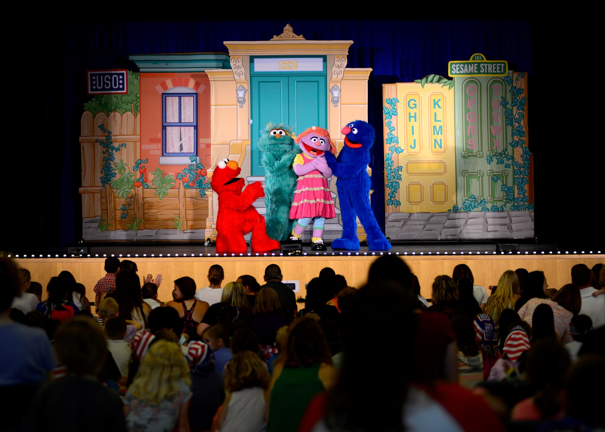 Characters perform during the Sesame Street/USO Experience for Military Families show, June 16, 2015, at Aviano Air Base, Italy. The show encouraged children to have fun while learning important tools for moving to a new base or transitioning to civilian life. The show is scheduled to perform more than 100 shows at 45 military bases in nine countries. (U.S. Air Force photo by Senior Airman Areca T. Wilson/Released)