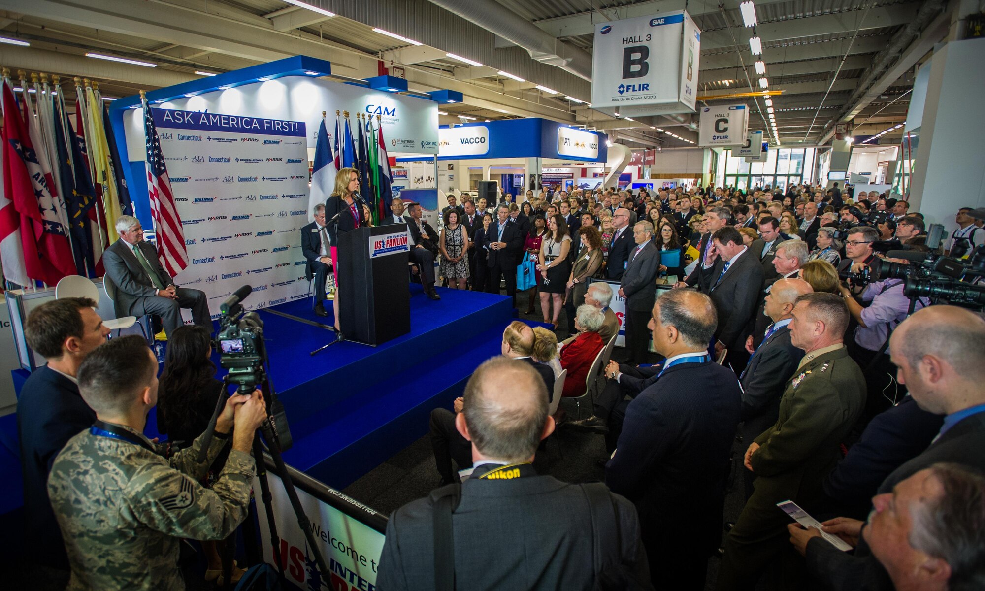PARIS -- Secretary of the Air Force Deborah Lee James speaks to U.S. senators, and governors during the U.S. Pavillion opening ceremony June 15, 2015 at the International Paris Air Show at Le Bourget Airport in Paris. The Paris Air Show provides a collaborative opportunity to share and strengthen the U.S. and European strategic partnership that has been forged during the last seven decades and is built on a foundation of shared values, experiences and vision. The event is expected to bring in 315,000 people, a record 2,215 companies, 150 aircraft, and will span 324,000 square meters. (U.S. Air Force photo/Tech. Sgt. Ryan Crane)