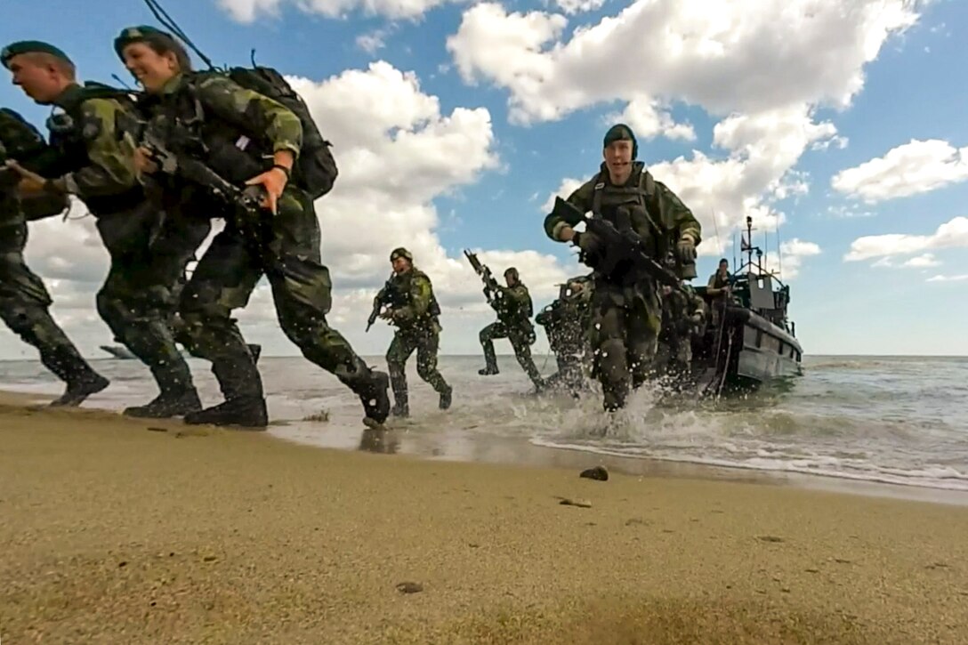 NATO's response force and U.S., U.K., Swedish and Finnish Marines simulate amphibious assaults during Baltic Operations 2015 on a Swedish beachhead, June 10, 2015.