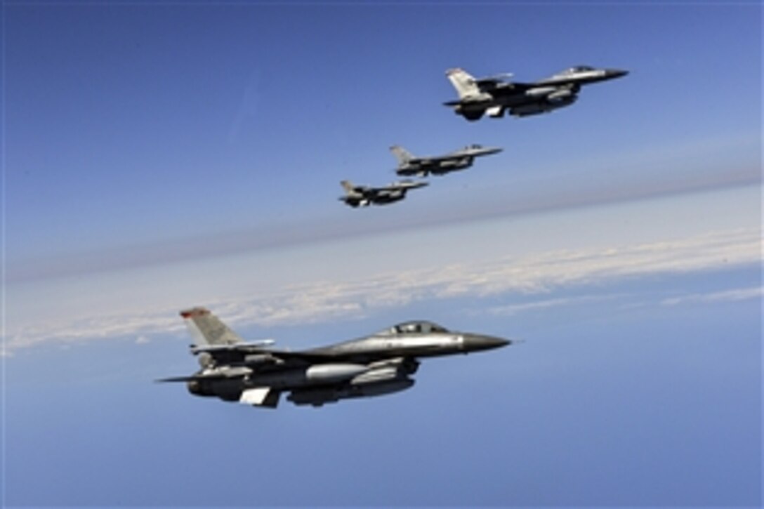 Four F-16 Fighting Falcons conduct a refueling mission during Baltic Operations 2015 over the Baltic Sea, June 15, 2015. The Falcons are assigned to the 480th Fighter Squadron.