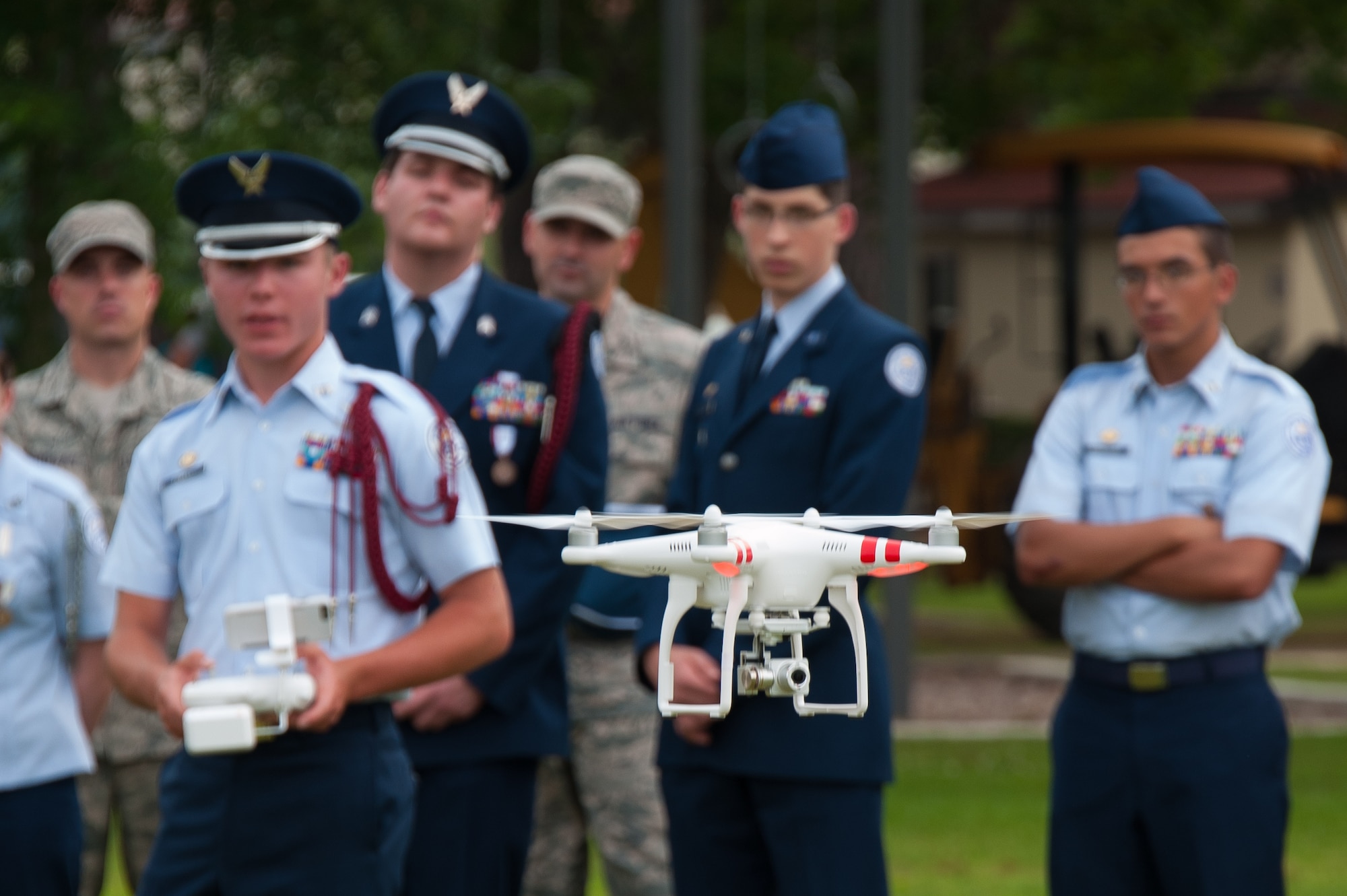 Air Force Junior ROTC members fly a drone aircraft