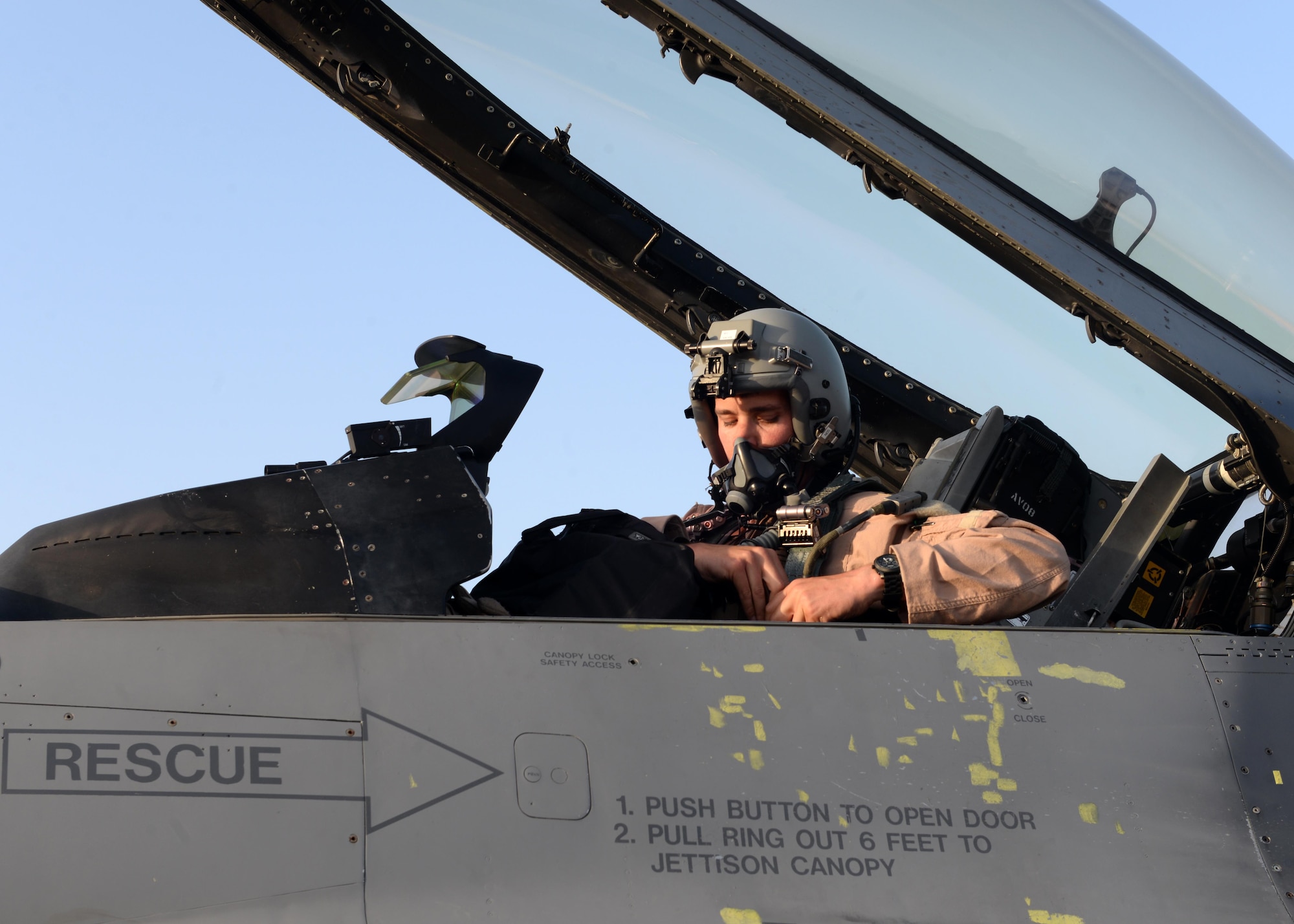 U.S. Air Force Capt. Dakota Olsen, 555th Expeditionary Fighter Squadron F-16 Fighting Falcon pilot, prepares to fly a combat airpower mission June 17, 2015, at Bagram Airfield, Afghanistan.  Olsen’s job is to provide close air support and armed over watch for military personnel in Afghanistan. He flies various sorties and missions throughout the country on a daily basis providing airpower to ensure a safe and secure environment for personnel at BAF. (U.S. Air Force photo by Senior Airman Cierra Presentado/Released)