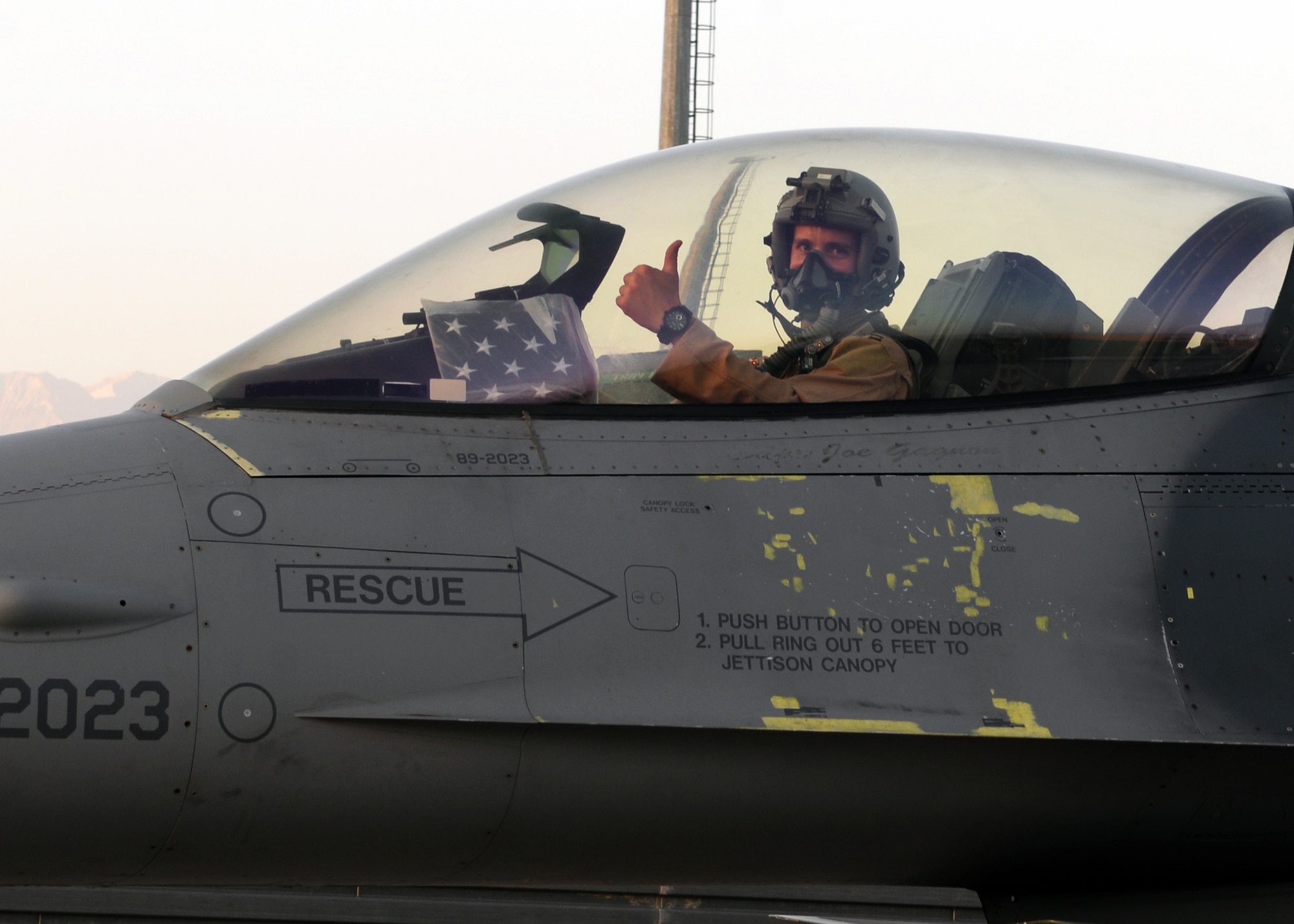 U.S. Air Force Capt. Dakota Olsen, 555th Expeditionary Fighter Squadron F-16 Fighting Falcon pilot, prepares to fly a combat airpower mission June 17, 2015, at Bagram Airfield, Afghanistan.  Olsen’s job is to provide close air support and armed over watch for military personnel in Afghanistan. He flies various sorties and missions throughout the country on a daily basis providing airpower to ensure a safe and secure environment for personnel at BAF. (U.S. Air Force photo by Senior Airman Cierra Presentado/Released)