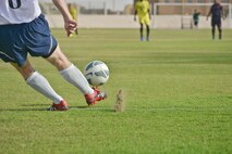 A U.S. Air Force member of the Al Udeid All-Stars kicks from the goal line to the infield during a soccer match between deployed U.S. and Qatari military members in celebration of the 240th U.S.  Army birthday June 14, 2015 at Al Udeid Air Base, Qatar. AUAB All-Stars planned a soccer match to help strengthen the partnership between the U.S. and Qatari military and build friendships between service members. (U.S. Air Force photo/Staff Sgt. Alexandre Montes)