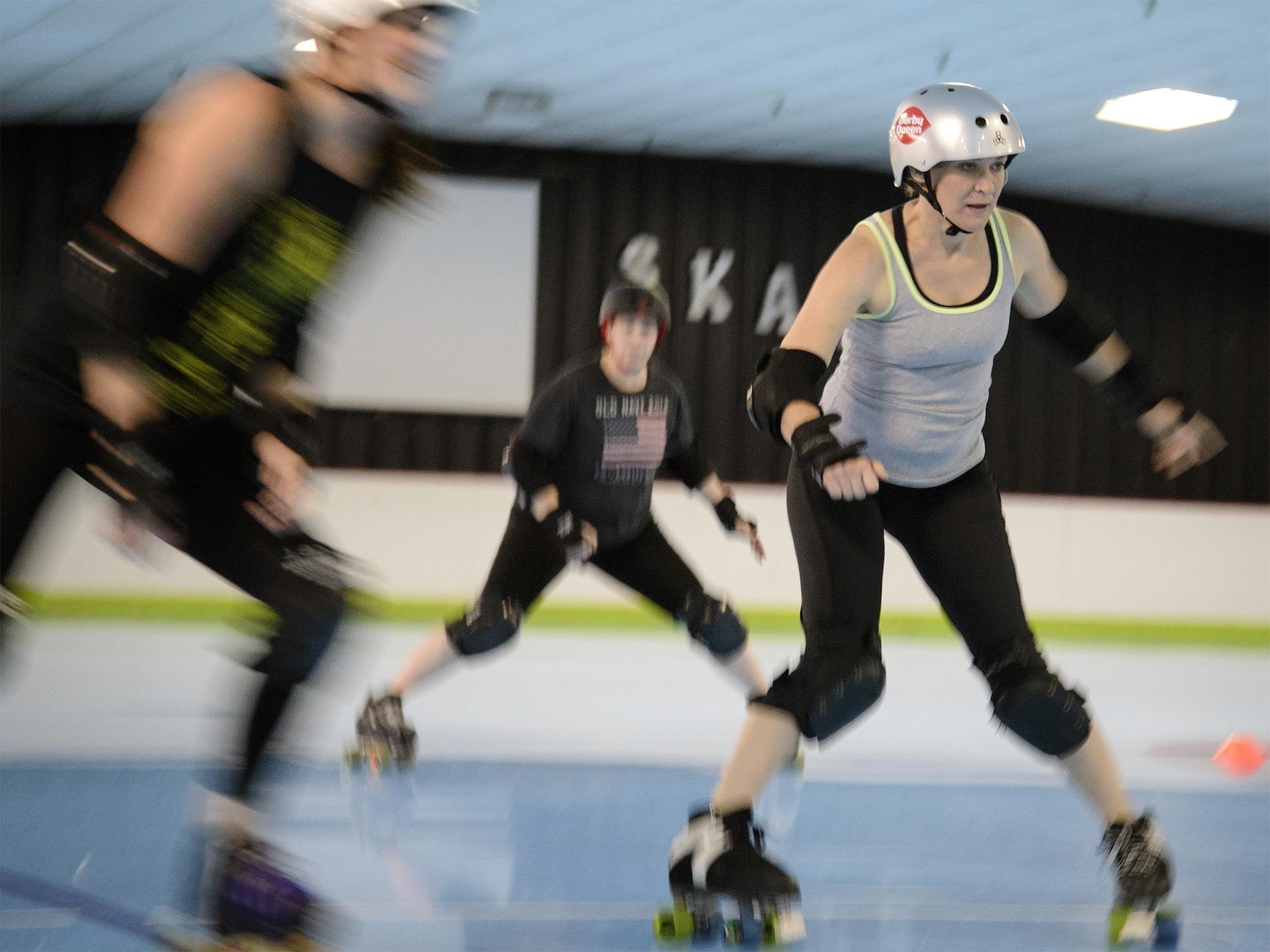 Shawn Kelley, a Vance Air Force Base mental health specialist, skates laps at Skate Town in Enid, Oklahoma, June 18. Kelley skates with the Enid Roller Girls, a local flat track roller derby team, to bolster her physical, social and mental well-being. She will be a part of an upcoming, three-part series highlighting Team Vance members who have dedicated themselves to pastimes that help strengthen their resiliency skills. (U.S. Air Force photo by David Poe)