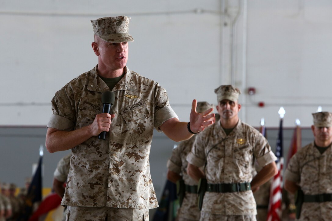 Brig. Gen. Paul J Rock Jr. addresses the crowd during a change of command ceremony at Marine Corps Air Station Cherry Point, N.C., June 18, 2015. Maj. Gen. Robert F. Hedelund relinquished his post as 2nd Marine Aircraft Wing commanding general to Rock during the ceremony.