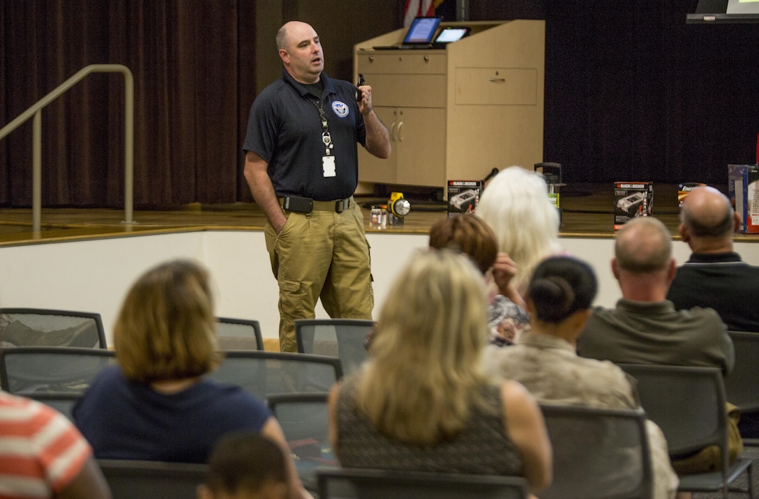 Collin Arnold, New Orleans Homeland Security Emergency Preparedness manager, speaks at a hurricane preparedness brief in the Federal City auditorium in New Orleans, June 17, 2015. Military members of the New Orleans area attended the brief to learn how to prepare for hurricanes, what to do in the event of an evacuation, and resources available to them. The Office of Homeland Security and Emergency Preparedness is the coordinating public safety agency for the city of New Orleans and is responsible for crisis planning, response and recovery for the City of New Orleans. 