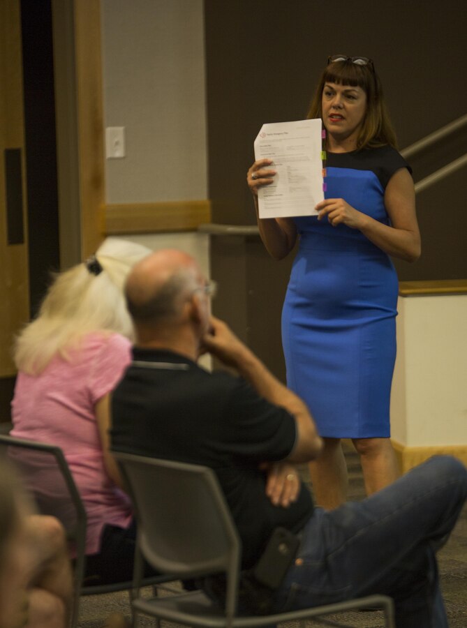 Gabriela Shearer, a family readiness trainer with Marine Forces Reserve Marine Corps Family Team Building, speaks at a hurricane preparedness brief in the Federal City auditorium in New Orleans, June 17, 2015. MCFTB provides educational resources and services to foster personal growth and enhance the readiness of Marines, Sailors and their families. Military members stationed in the New Orleans area attended the brief to learn how to prepare for hurricanes, what to do in the event of an evacuation, and resources available to them. 