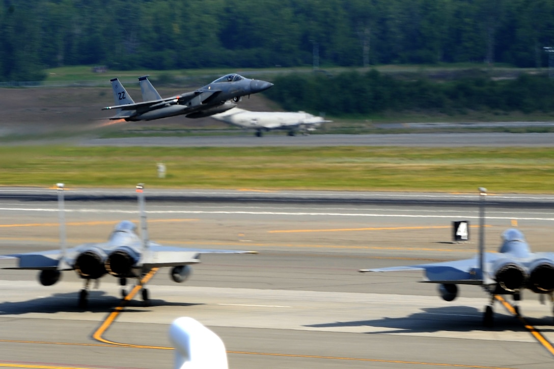 An F-15C Eagle from the 67th Fighter Squadron at Kadena Air Base, Japan, takes off during exercise Northern Edge from Joint Base Elmendorf-Richardson, Alaska, June 16, 2015. Northern Edge 2015 is Alaska’s premier joint training exercise designed to practice operations, techniques and procedures as well as enhance interoperability among the services. Thousands of participants from all the services and components were involved. (U.S. Air Force photo/Staff Sgt. William Banton)