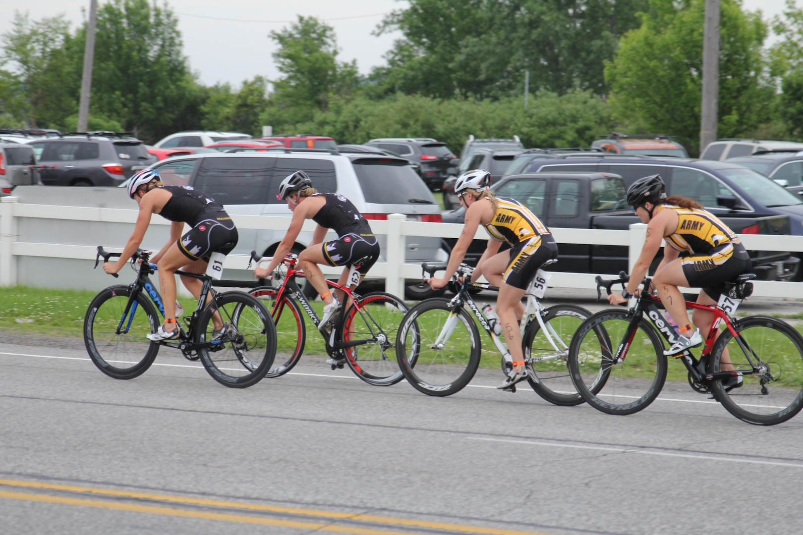 Lead Women’s pack of the 2015 Armed Forces Triathlon Championship at Wolf Lake in Hammond, Ind. held in conjunction with Leon's Triathlon on June 7, 2015. From left to right: Marine Corps’ 2nd lt. Kellie Darmody and Colleen Randolph followed by Army’s  2nd lt. Jessica Clay and 2nd lt. Justine Emge.  Clay and Emge would place 3rd and 4th overall.