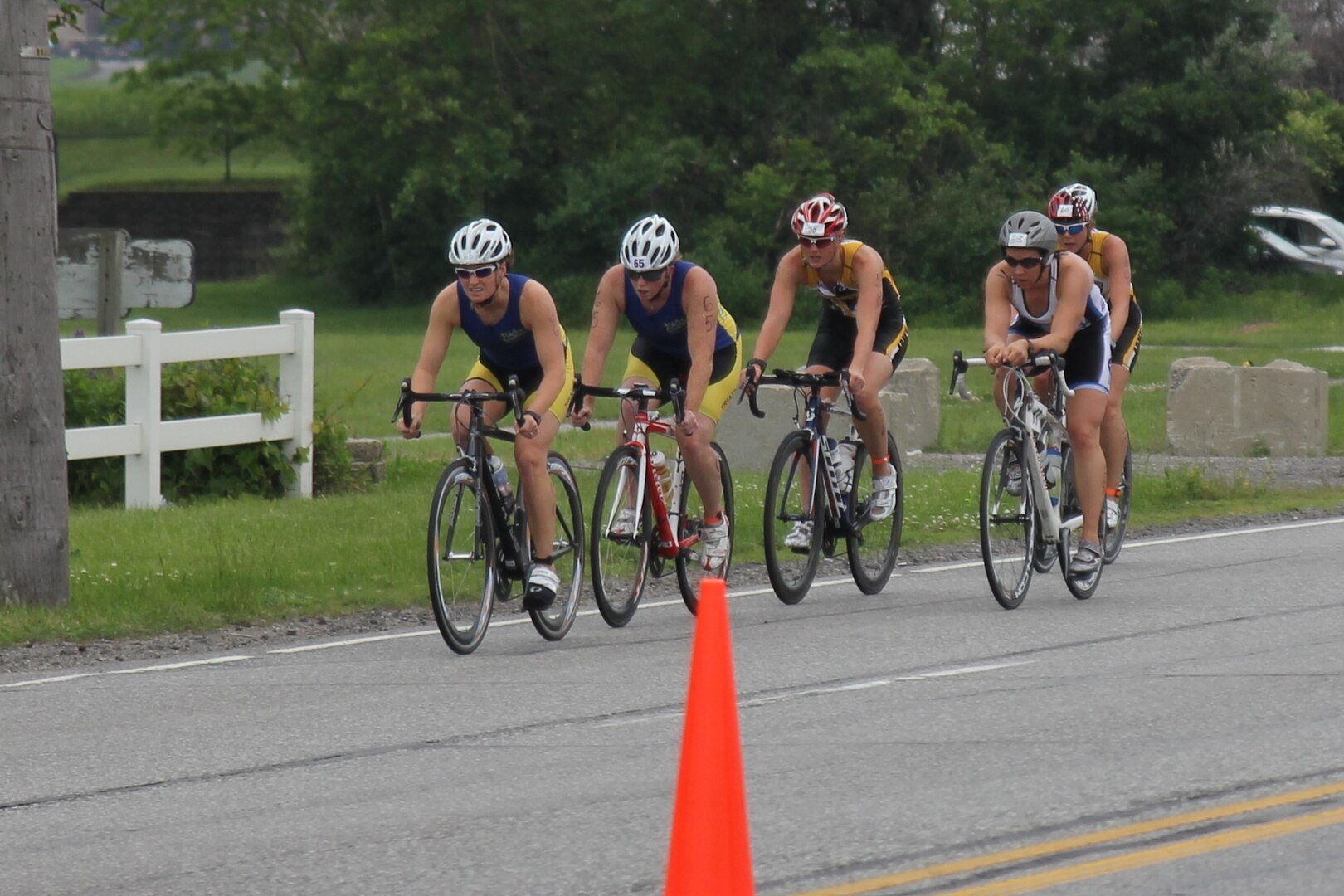Armed Forces Women’s Triathlon Champion Army 2nd lt. Samone Franzese of Fort Sam Houston, Texas (center) along with other women riders during the 2015 Armed Forces Triathlon Championship at Wolf Lake in Hammond, Ind. held in conjunction with Leon's Triathlon on June 7, 2015.