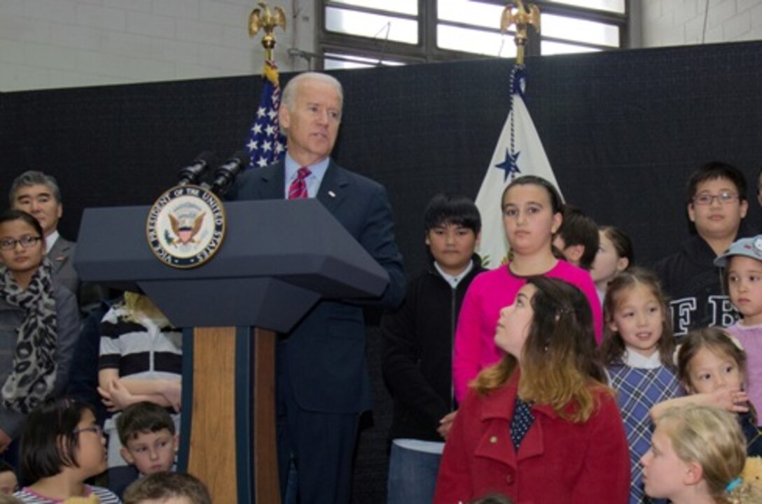 Vice President Joseph R. Biden meets with service members and their families at Collier Field House on United States Army Garrison Yongsan, South Korea, Dec. 7, 2013. U.S. Army Photo/Sgt. Brian Gibbons