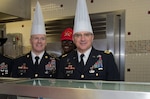 Gen. Curtis M. Scaparrotti, United Nations Command, Combined Forces Command, United States Forces Korea commander, and CSM John W. Troxell, United Nations Command, Combined Forces Command, United States Forces Korea command sergeant major, serve Thanksgiving dinner and visit with USFK service members at Camp Hovey, K-16, Osan airbase and Camp Mujak, South Korea, Nov. 25, 2013. U.S. Army Photo/Sgt. Brian Gibbons