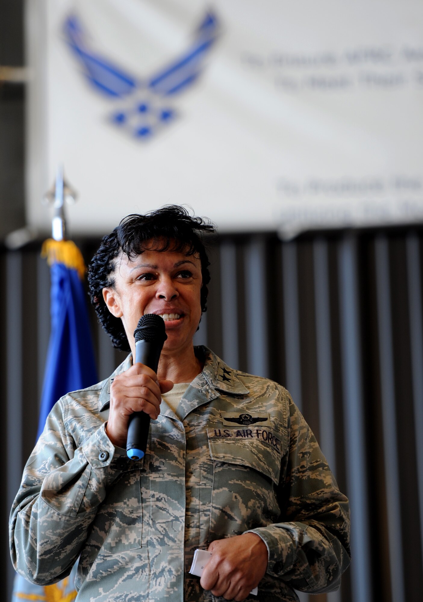 U.S. Air Force Maj. Gen. Stayce Harris, 22nd Air Force commander, Air Force Reserve Command, briefs the competitors at the opening ceremony of the Port Dawg Challenge at Dobbins Air Reserve Base, Ga., June 16, 2015. The Port Dawg Challenge was created to enhance and maintain the camaraderie, esprit de corps and prestige of aerial port Airmen while promoting professionalism, leadership, training and communication between "Port Dawgs." (U.S. Air Force photo by Tech. Sgt. Stephen D. Schester/Released)