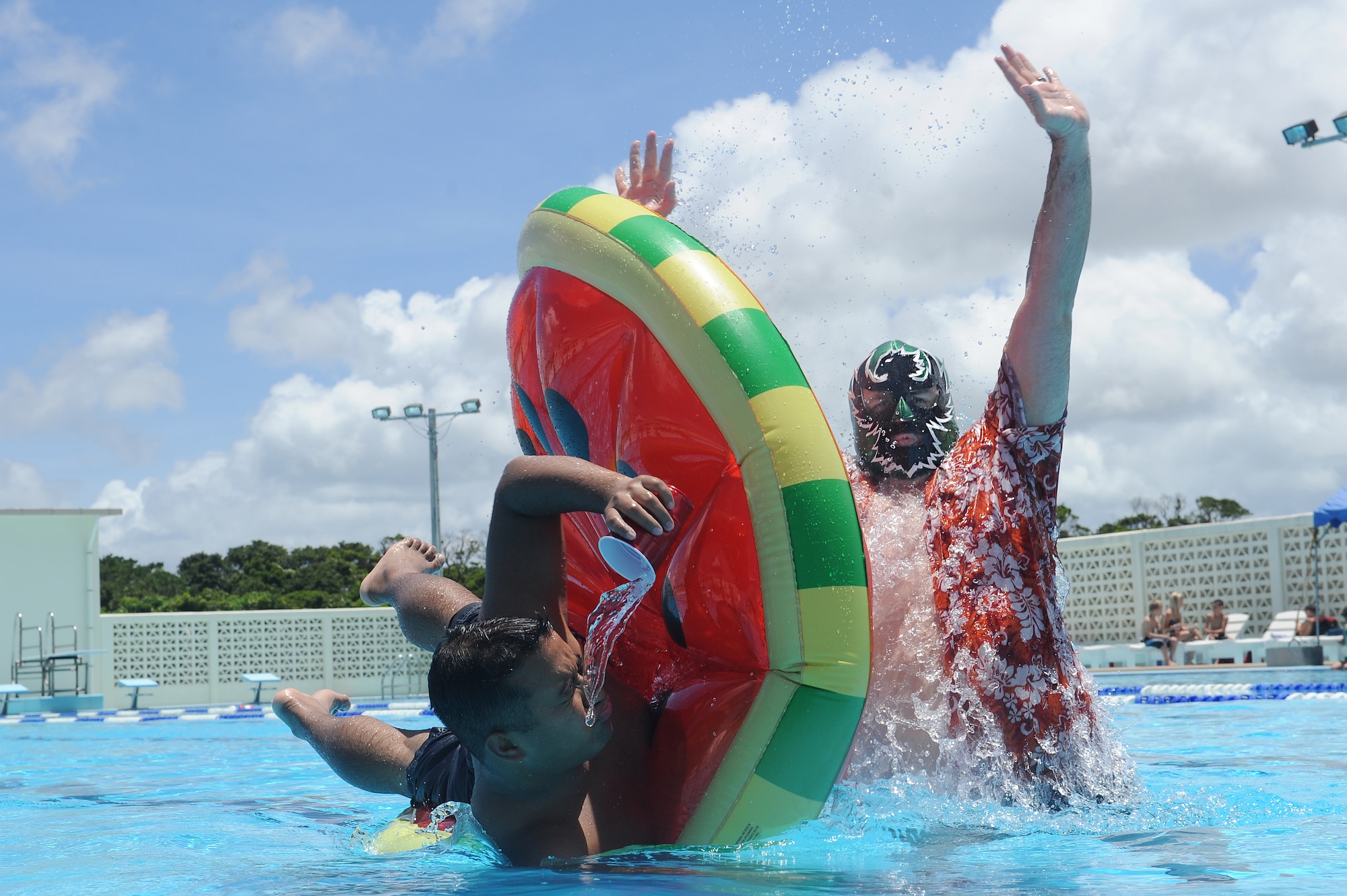 “Common Sense Lucha” helps an Airman make good choices while enjoying the summer sun at Kadena Air Base's Hagerstrom Pool, June 18, 2015. Alcohol numbs the senses and reduces reaction time, a combination which significantly increases the risk of drowning. If you plan to drink around water, be sure to practice personal risk management and always have a wingman. (U.S. Air Force photo by Airman 1st Class Zade C. Vadnais)

