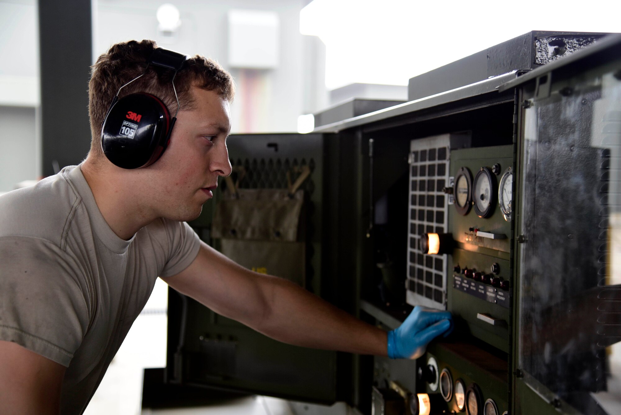 U.S. Air Force Senior Airman Wladimir Sierra, 35th Maintenance Squadron aerospace ground equipment journeyman, turns on a diesel generator at Misawa Air Base, Japan, June 17, 2015. Regular checks are conducted by AGE Airmen on equipment that supplies electricity, hydraulic pressure and air pressure to Misawa’s F-16 Fighting Falcons. (U.S. Air Force photo by Airman 1st Class Jordyn Fetter/Released)