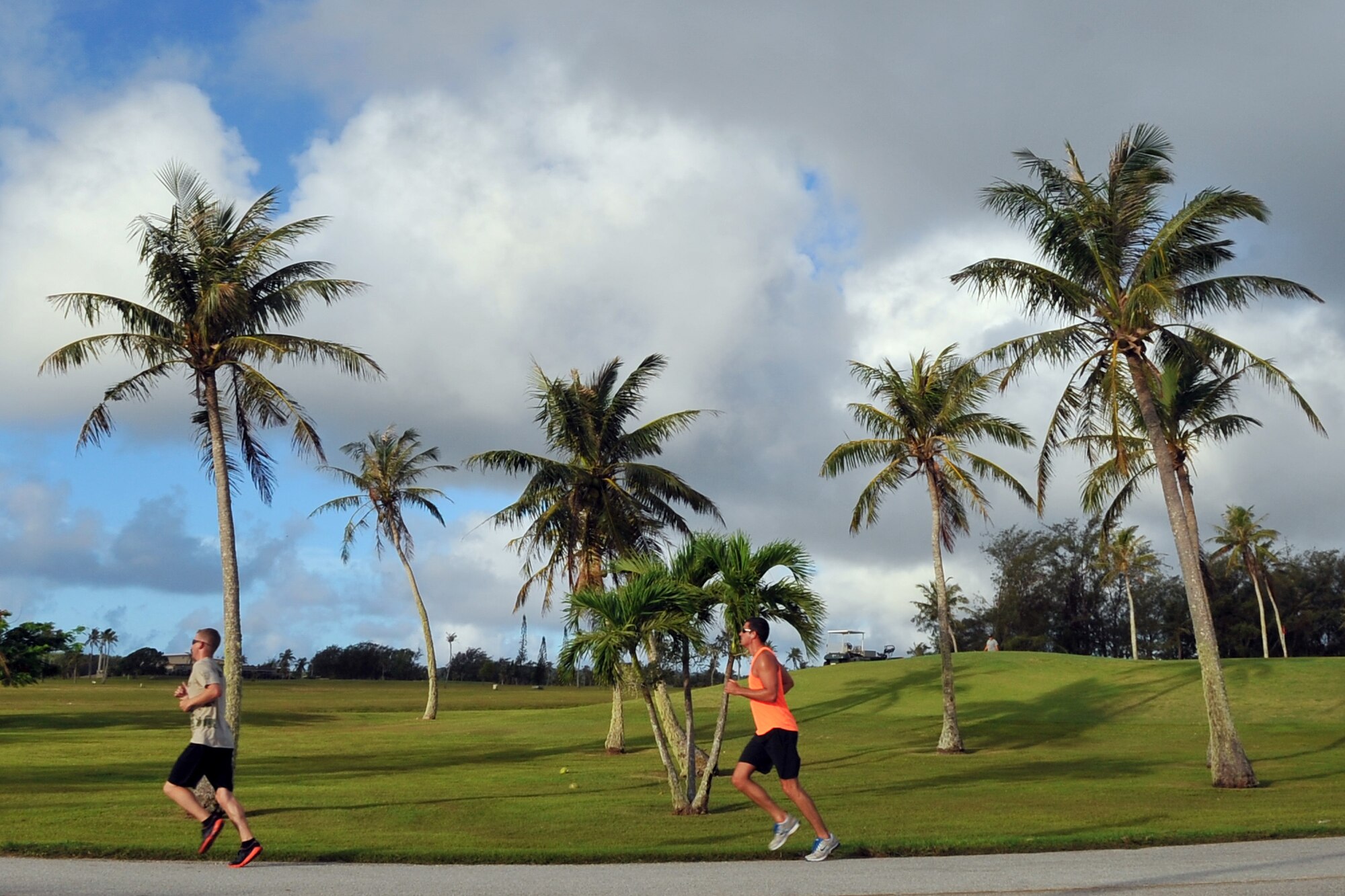 Participants run toward the finish line of the Father’s Day 5K June 19, 2015, at Andersen Air Force Base, Guam. More than 100 Team Andersen members gathered for the event to commemorate Father’s Day, which is held June 21 this year. (U.S. Air Force photo by Staff Sgt. Melissa B. White/Released)
