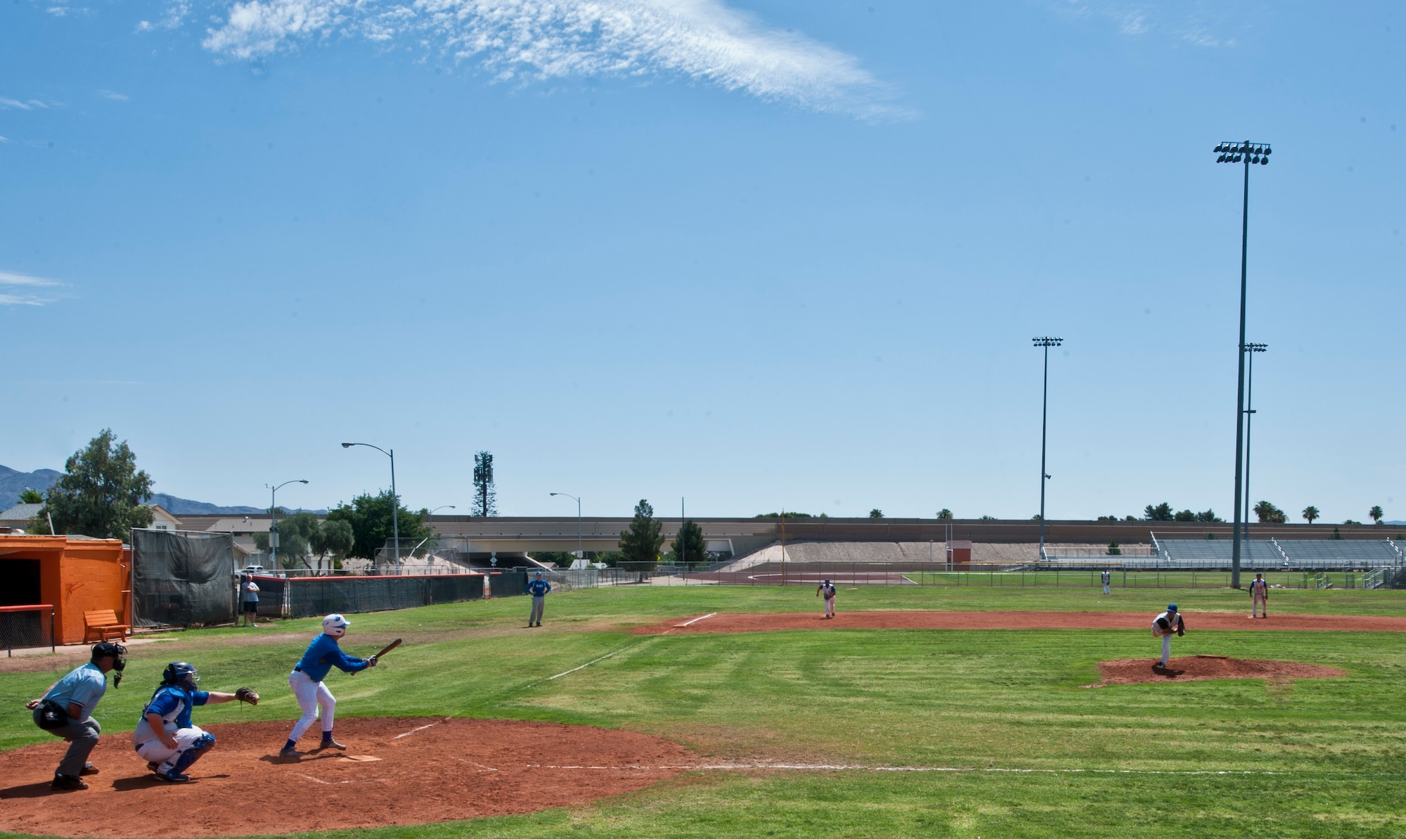 Nathan Lee, Las Vegas Blues team member, bunts during a baseball game in Las Vegas, June 14, 2015. The Blues consists of 13 players, 12 of whom are Airmen from Nellis and Creech Air Force Bases. (U.S. Air Force photo by Airman 1st Class Jake Carter)