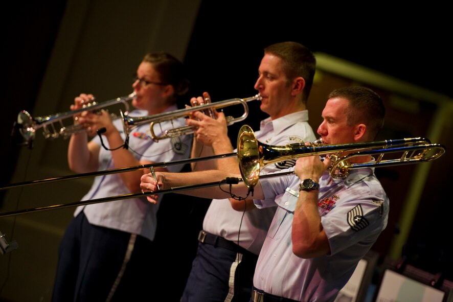 The brass section of U.S. Air Force Heartland of America Band Vortex performs in Nelson Hall Auditorium at Minot State University, Minot, N.D., June 16, 2015. The show was dedicated to local Vietnam veterans and featured songs from 1965 to 1975. (U.S. Air Force photo/Airman 1st Class Justin T. Armstrong)