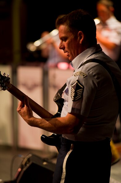 Master Sgt. Jerry Birkenmeier, a St. Louis, Missouri native, plays guitar for U.S. Air Force Heartland of America Band Vortex in Nelson Hall Auditorium at Minot State University, Minot, N.D., June 16, 2015. Birkenmeier is the NCO in charge of the band Vortex and one of the team’s guitarists. (U.S. Air Force photo/Airman 1st Class Justin T. Armstrong)