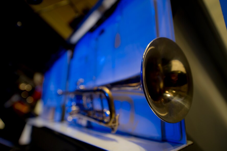 A trumpet, belonging to U.S. Air Force Heartland of America Band Vortex, rests on a music stand in Nelson Hall Auditorium at Minot State University, Minot, N.D., June 16, 2015. The set list included such hits as “Danny Boy” and “The Green Beret”. (U.S. Air Force photo/Airman 1st Class Justin T. Armstrong)