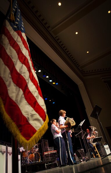 Members of the U.S. Air Force Heartland of America Band Vortex perform in Nelson Hall, at Minot State University, Minot N.D., June 16, 2015. The show was dedicated to local Vietnam veterans and featured songs from 1965 through 1975. (U.S. Air Force photo/Senior Airman Stephanie Morris)
