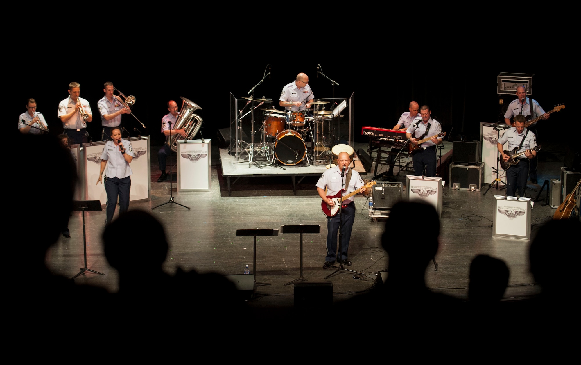 Members of the U.S. Air Force Heartland of America Band Vortex perform in Nelson Hall, at Minot State University, Minot N.D., June 16, 2015. The show was dedicated to local Vietnam veterans and featured songs from 1965 through 1975. (U.S. Air Force photo/Senior Airman Stephanie Morris)