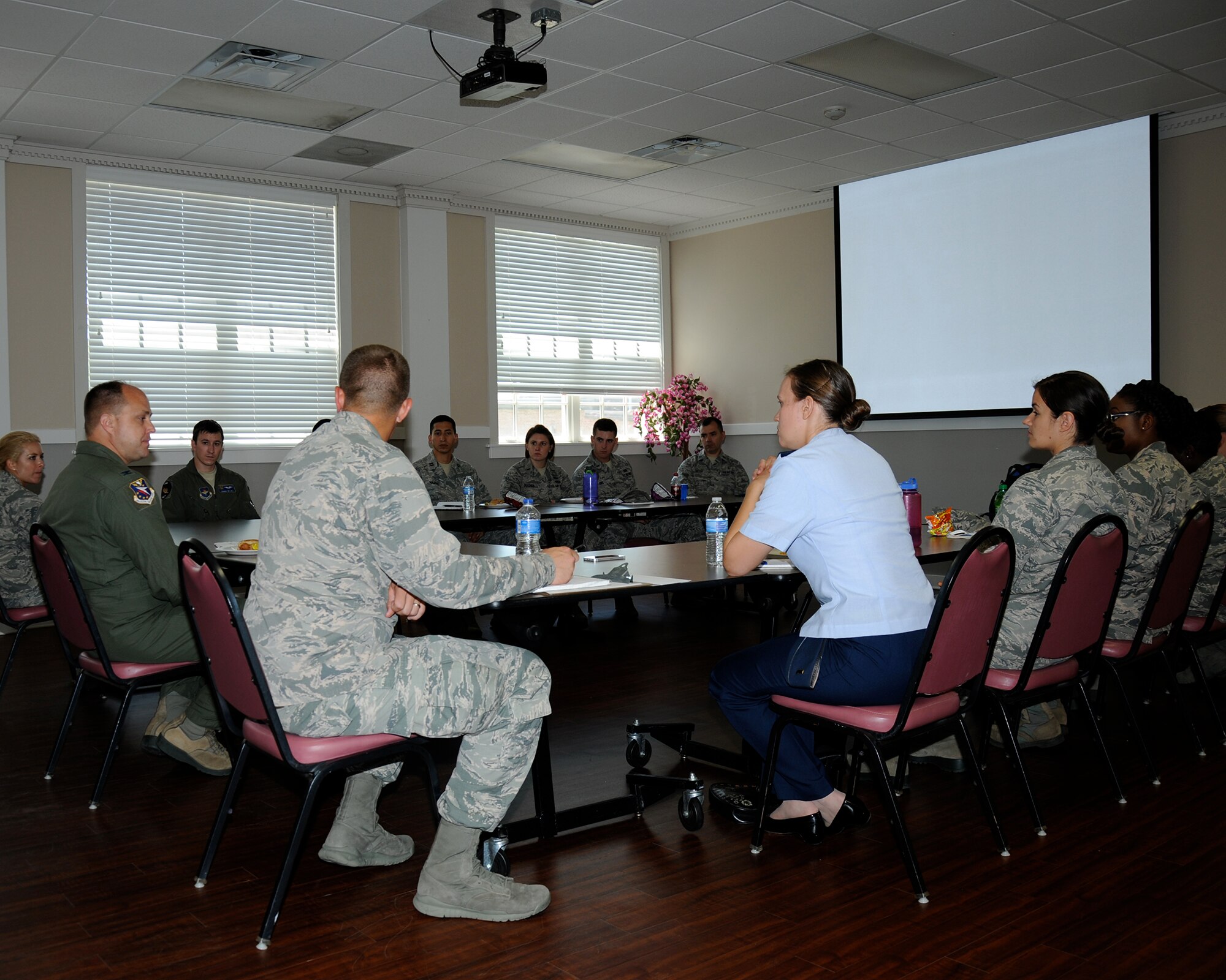 Col. John Nichols, 14th Flying Training Wing Commander, speaks to company grade officers at the CGOC luncheon June 15 on Columbus Air Force Base, Mississippi. During the hour-long luncheon the colonel provided mentorship on a variety of issues facing young officers, including proactive leadership and creating a culture of engagement. (U.S. Air Force photo/Sharon Ybarra)
