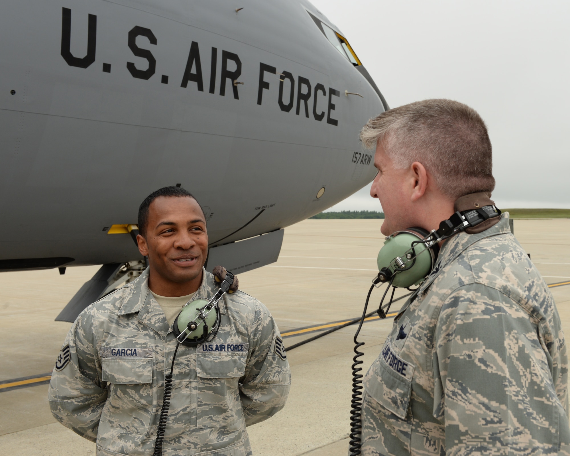 Col. Albert G. Miller, 22nd Air Refueling Wing commander (right), speaks to Tech. Sgt. Brandon P. Garcia at Pease Air National Guard Base, New Hampshire on June 16, 2015.  Miller is visiting Pease because his McConnell Air Force Base, Kan. wing oversees Pease’s active duty component, the 64th Air Refueling Squadron.  (U.S. Air National Guard photo by Staff Sgt. Curtis J. Lenz)