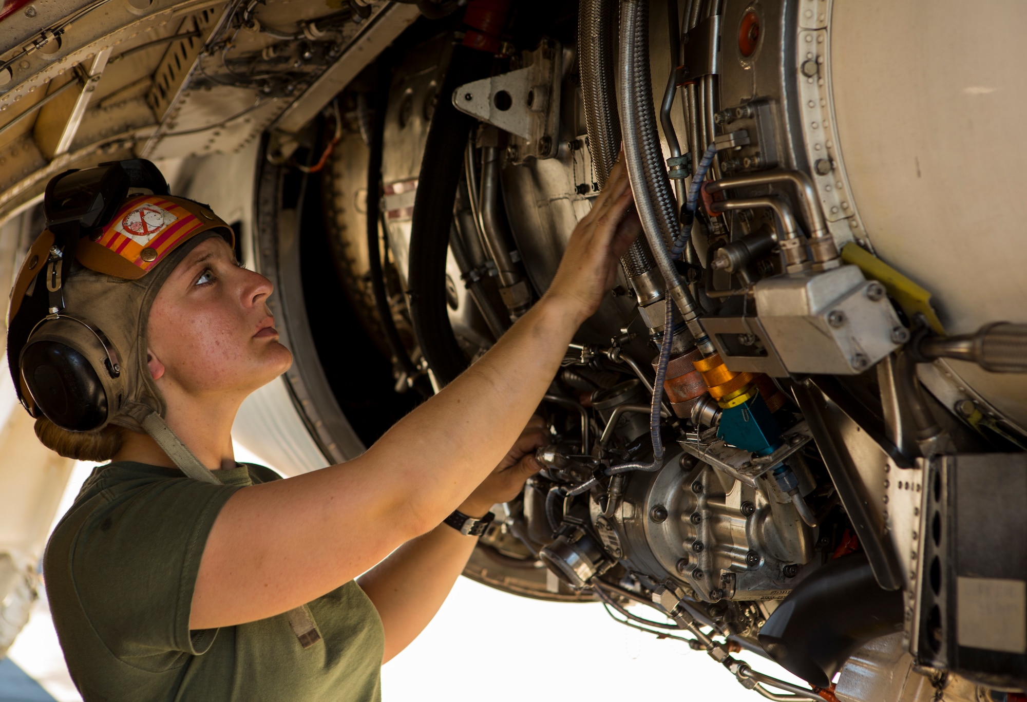 U.S. Marine Corps Lance Cpl. Jessica Kerr, a plane captain with Marine Tactical Electronic Warfare Squadron (VMAQ) 2, 2nd Marine Aircraft Wing conducts maintenance on a Marine Corps EA-6B Prowler assigned to VMAQ-2, prior to a flight during Exercise Northern Edge 15 at Eielson Air Force Base, Alaska, June 15, 2015. Northern Edge is Alaska’s premier joint training exercise designed to practice operations, techniques and procedures as well as enhance interoperability among the services. Thousands of participants from all services, Airmen, Soldiers, Sailors, Marines and Coast Guardsmen from active duty, Reserve and National Guard units are involved. (U.S. Marine Corps photo by Cpl. Suzanne Dickson/Released)