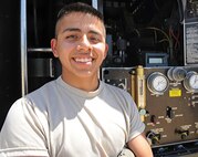 Airman Carlos Stear, 9th Logistics Readiness Squadron fuels distribution operator, poses for a photo June 16, 2015, at Beale Air Force Base, California. (U.S. Air Force photo by Airman Preston Cherry/Released)
