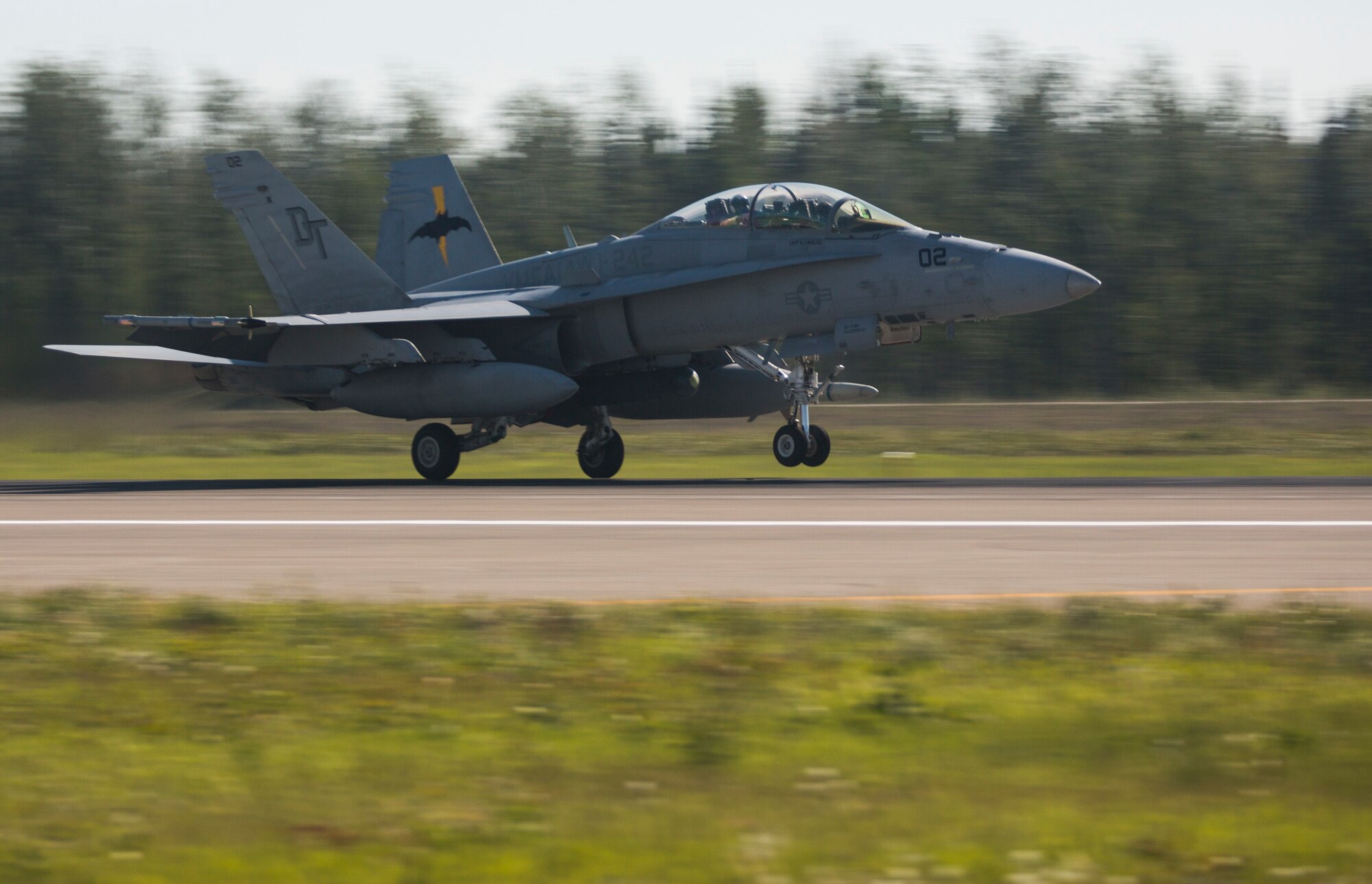 A U.S. Marine Corps F/A-18 Hornet aircraft assigned to Marine All-Weather Fighter Attack Squadron 242, 1st Marine Aircraft Wing, takes off June 15, 2015, during Exercise Northern Edge 15 at Eielson Air Force Base, Alaska. Northern Edge 15 is Alaska’s premier joint training exercise designed to practice operations, techniques and procedures as well as enhance interoperability among the services. Thousands of participants from all the services, Airmen, Soldiers, Sailors, Marines and Coast Guardsmen from active duty, Reserve and National Guard units are involved. (U.S. Marine Corps photo by Staff Sgt. Jeffrey D. Anderson/ Released)